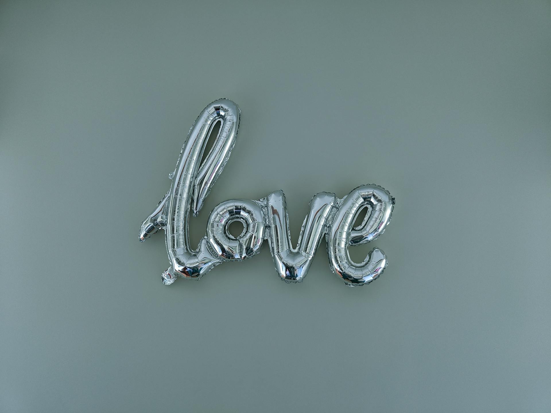 Love Script Made of a Silver Foil