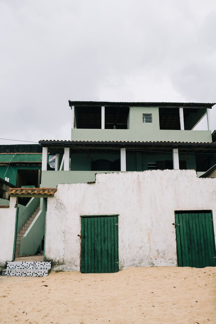 Facade Of An Old House On The Beach 