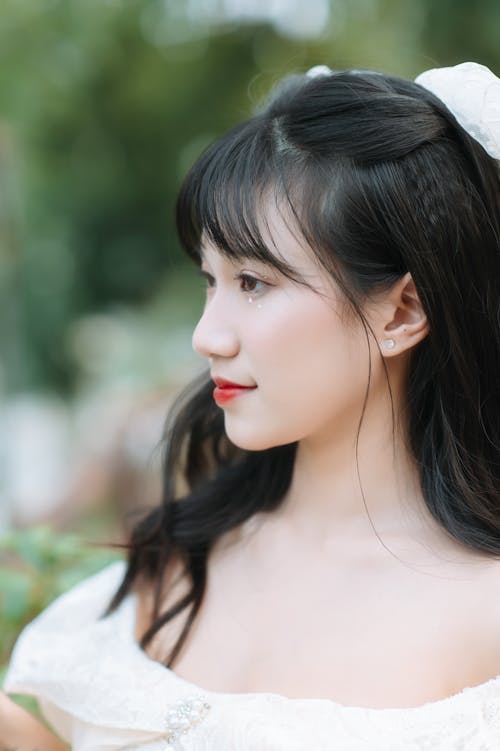 Closeup of a Brunette Girl Wearing Red Lipstick