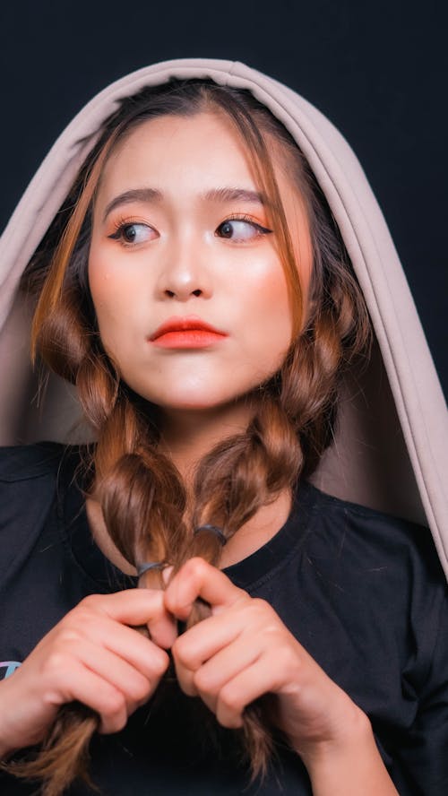 Young Woman with Braided Hair 