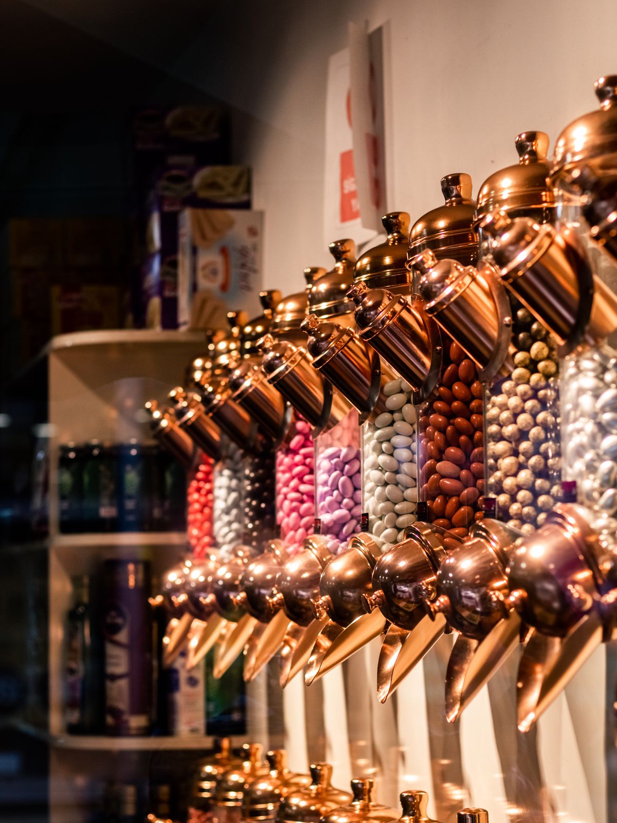 Colourful candy dispensers in a shop interior