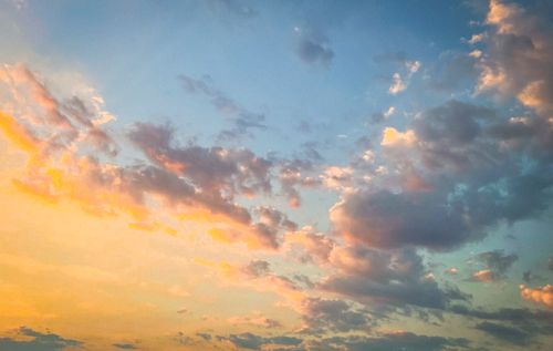 Free A stunning sunset sky over Kavala, Greece, with vibrant hues and scattered clouds. Stock Photo