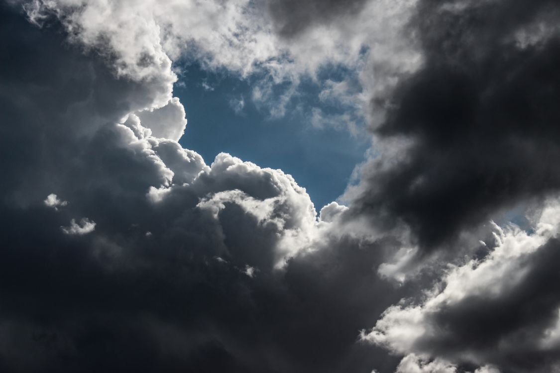 Free Dramatic cloud formations in the sky over Kavala, Greece, showcasing a moody and dynamic weather scene. Stock Photo