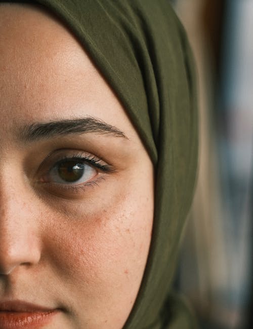 Portrait of a Young Woman Wearing Green Headscarf