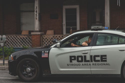 Foto d'estoc gratuïta de bandera americana, barri, cotxe de policia