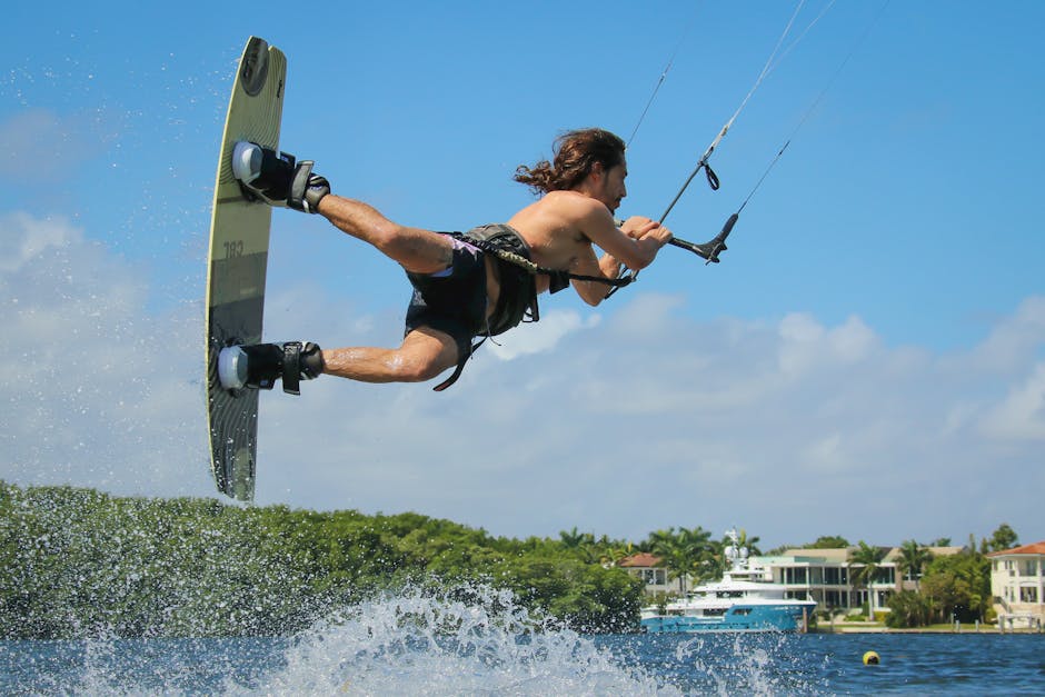Thrilling wakeboarding stunt captured midair in the sunny waters of Miami, Florida.