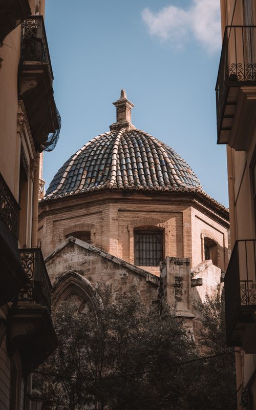 Free Intricate renaissance dome architecture of Valencia Cathedral captured in natural light. Stock Photo