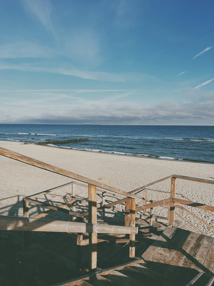 Wooden Stairs Leading To Beach