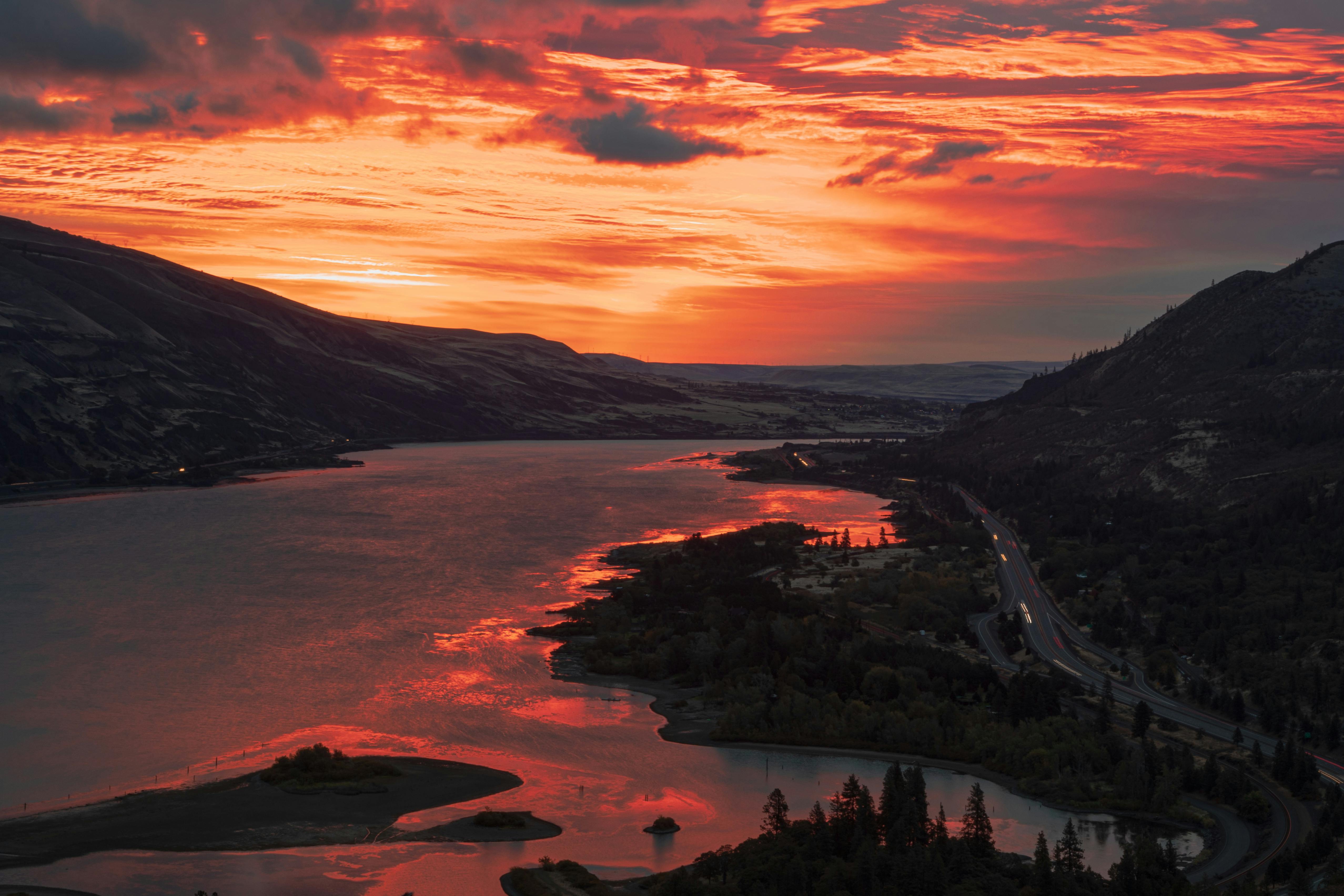 Sunset over the Columbia River Gorge, the river catching last light between the canyon walls