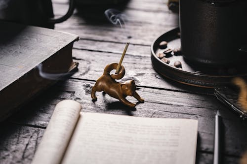 Free Cat Figurine, Incense Holder on Desk Stock Photo