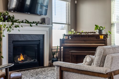 Piano by Fireplace