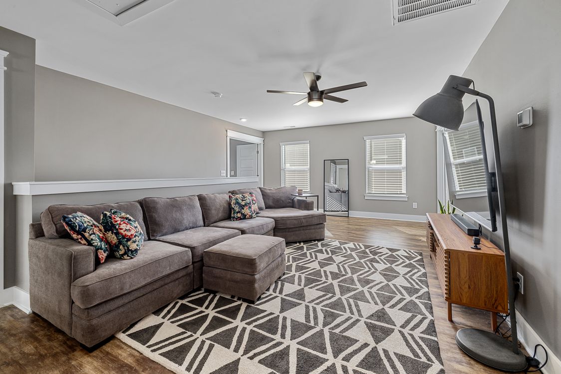 Styled living room with sofa for a home and garden purchase decision