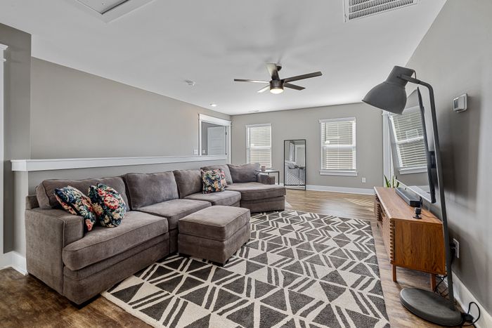 Modern cozy living room with sofa and stylish decor