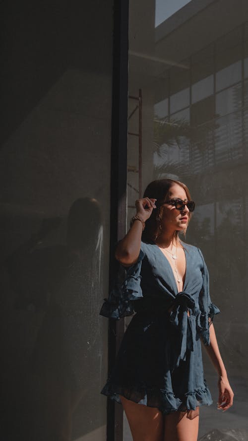 Woman Wearing Dress and Sunglasses