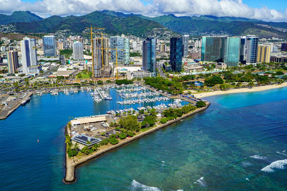 Photo by Cyrill Stunning aerial cityscape of Honolulu with a view of the beach, harbor, and skyline.