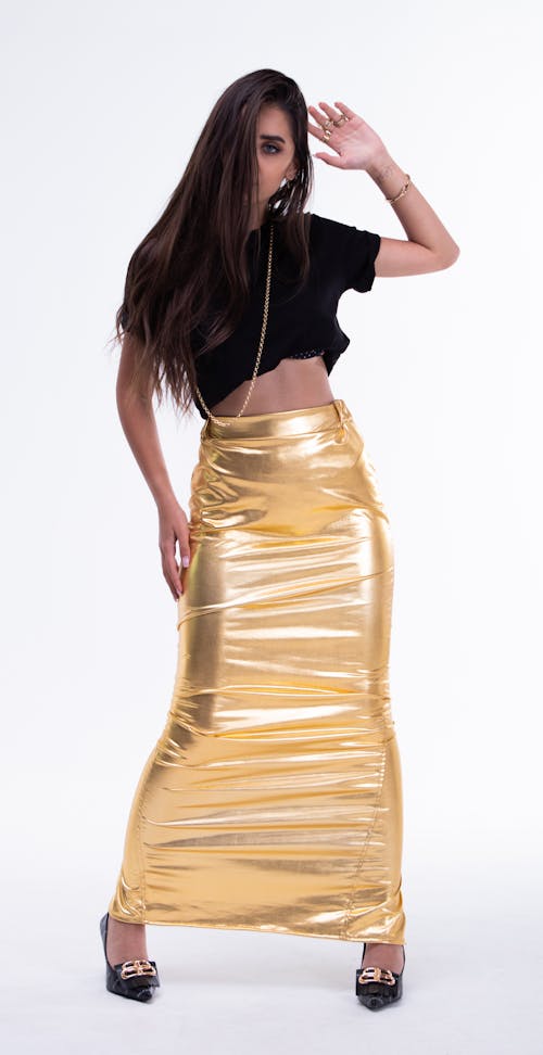 Brunette in Glistening Gold Skirt
