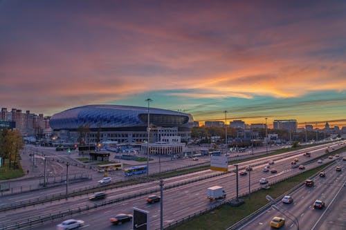 Vehicles On Asphalt Roads During Golden Hour