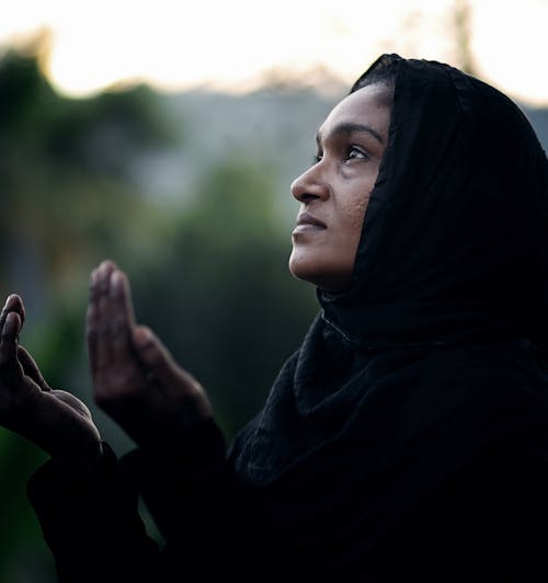 Praying Woman in Headscarf