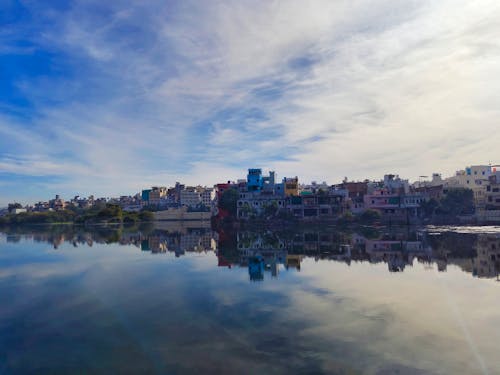 Free stock photo of blue lake, cityscape, landscape