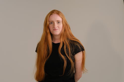 Young Red Haired Woman in Black T-Shirt