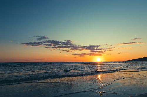 Free Breathtaking sunset over Ulcinj beach, Montenegro, capturing the serene seascape with vibrant colors. Stock Photo