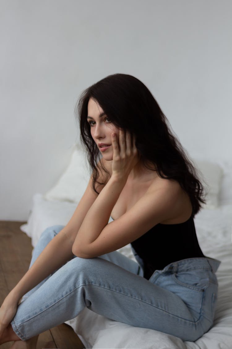 Brunette Posing In Jeans