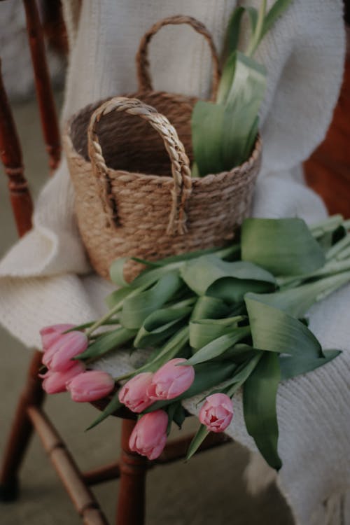 A Bunch of Pink Tulips and a Basket 