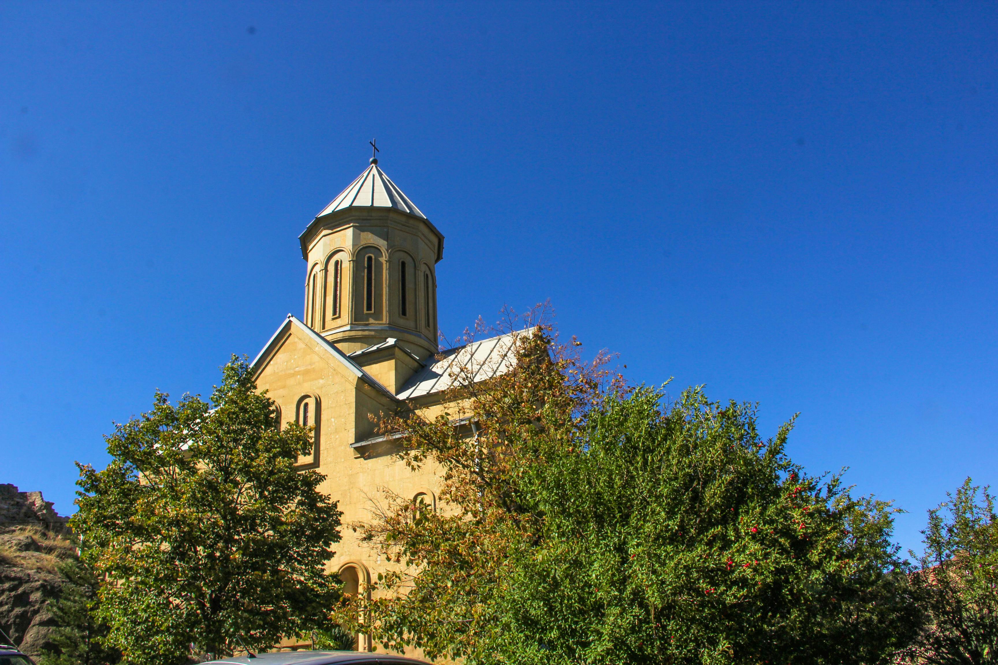 Open notebook with a to do list and pen on a table