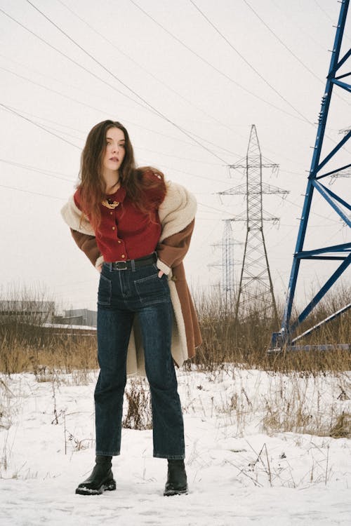 Young Woman on a Field in Winter 