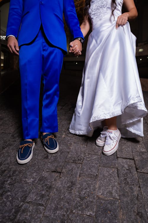 Woman Wedding Dress and Man Blue Suit