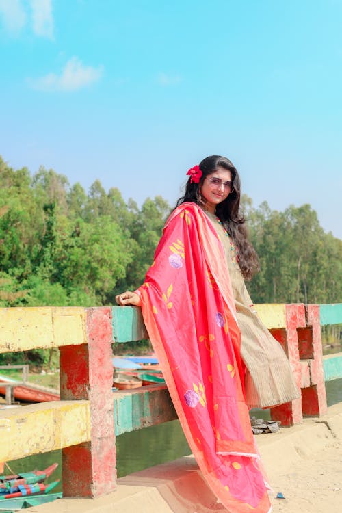 Woman Posing in Colorful Clothes