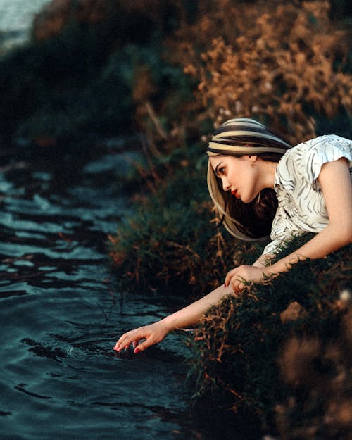 Woman Touching Water