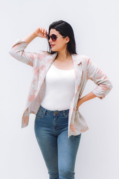 Model in a Floral Blazer and Jeans