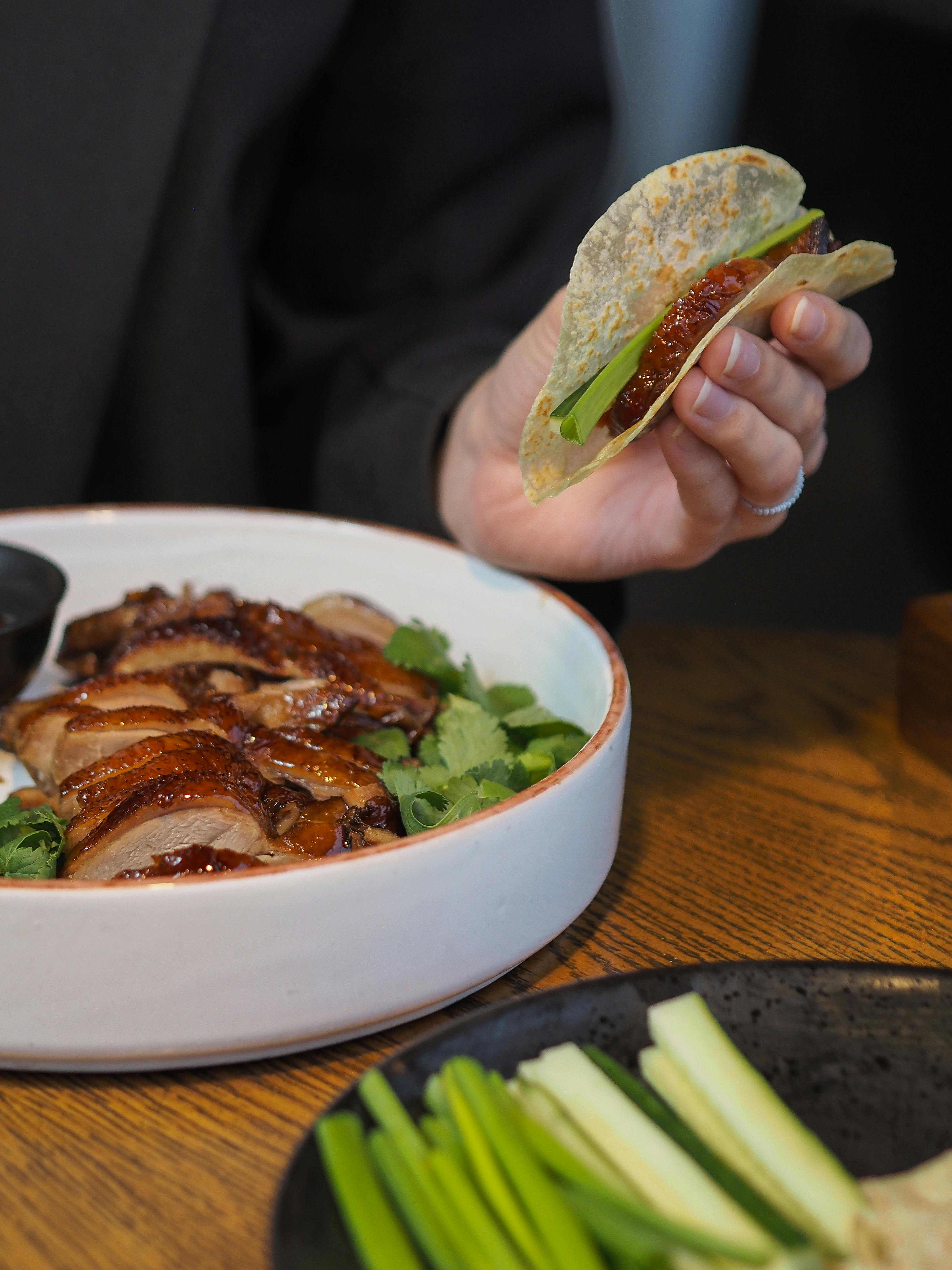 Person browsing crypto markets and news on a smartphone