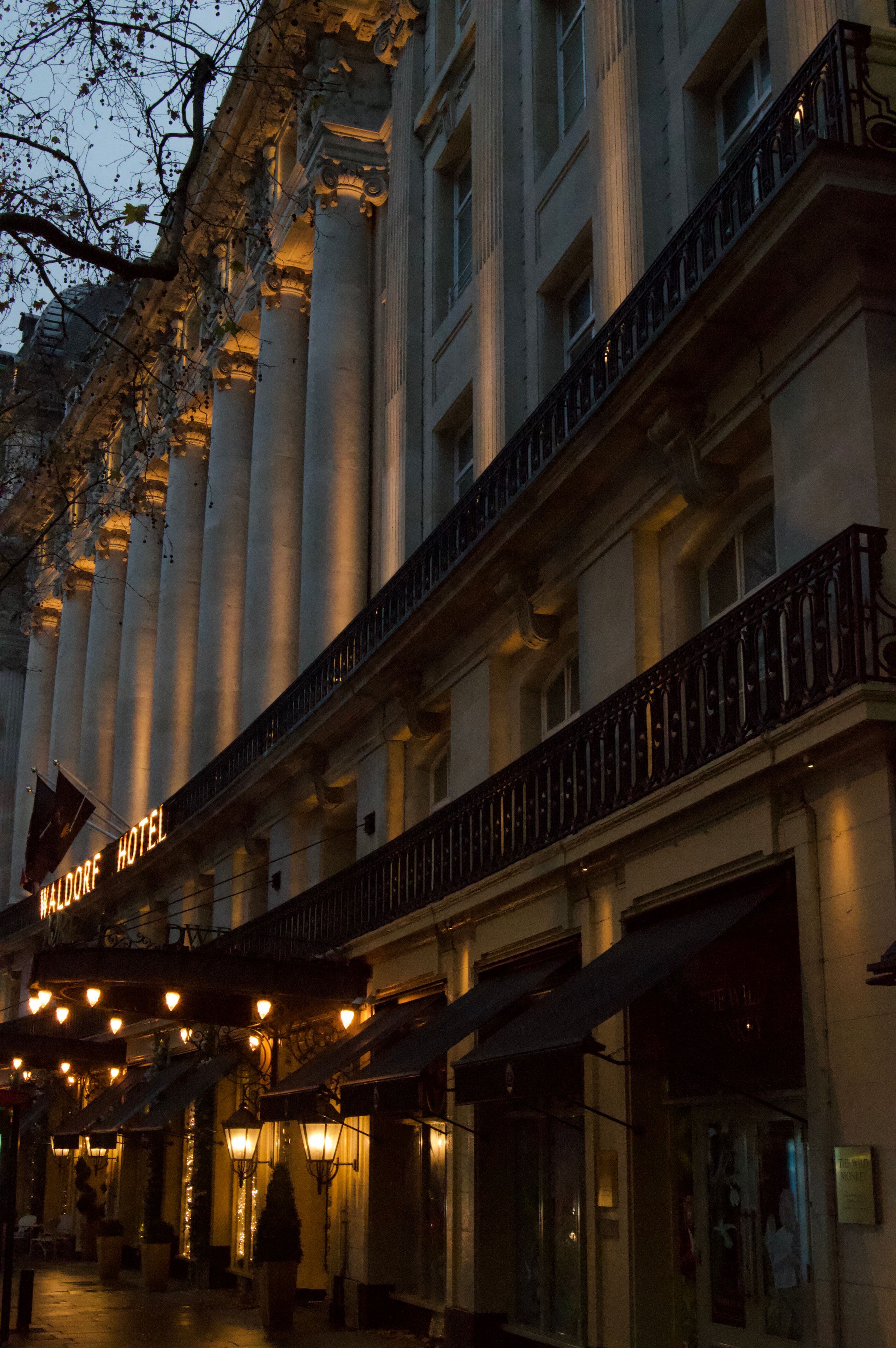 Classic London hotel facade illuminated at twilight