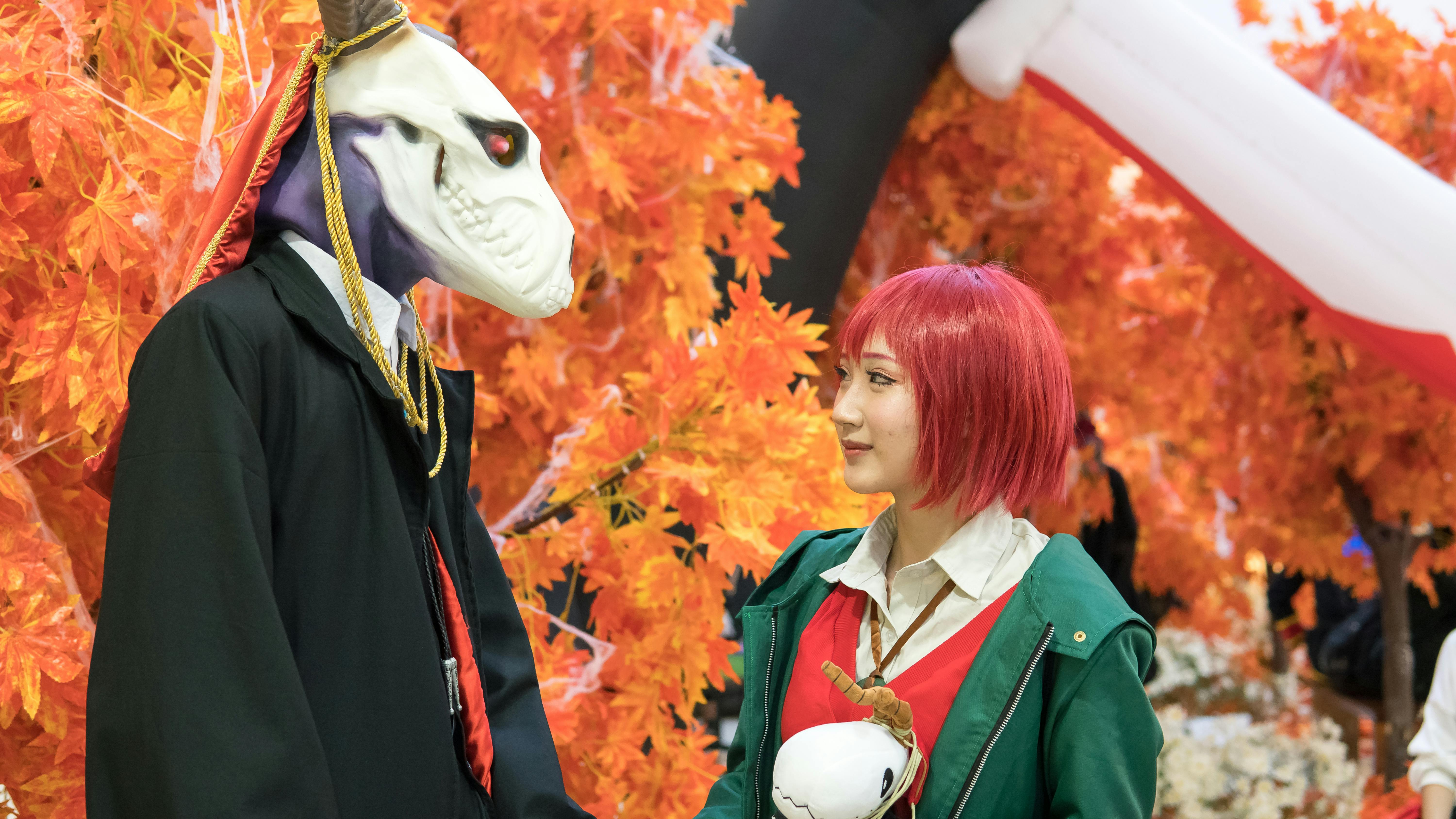 Two people sitting together and talking in a relaxed environment