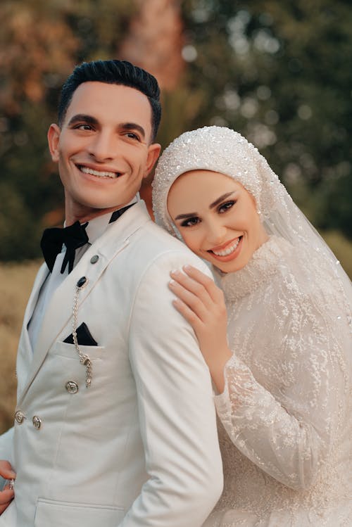 Portrait of Happy Bride and Groom Hugging