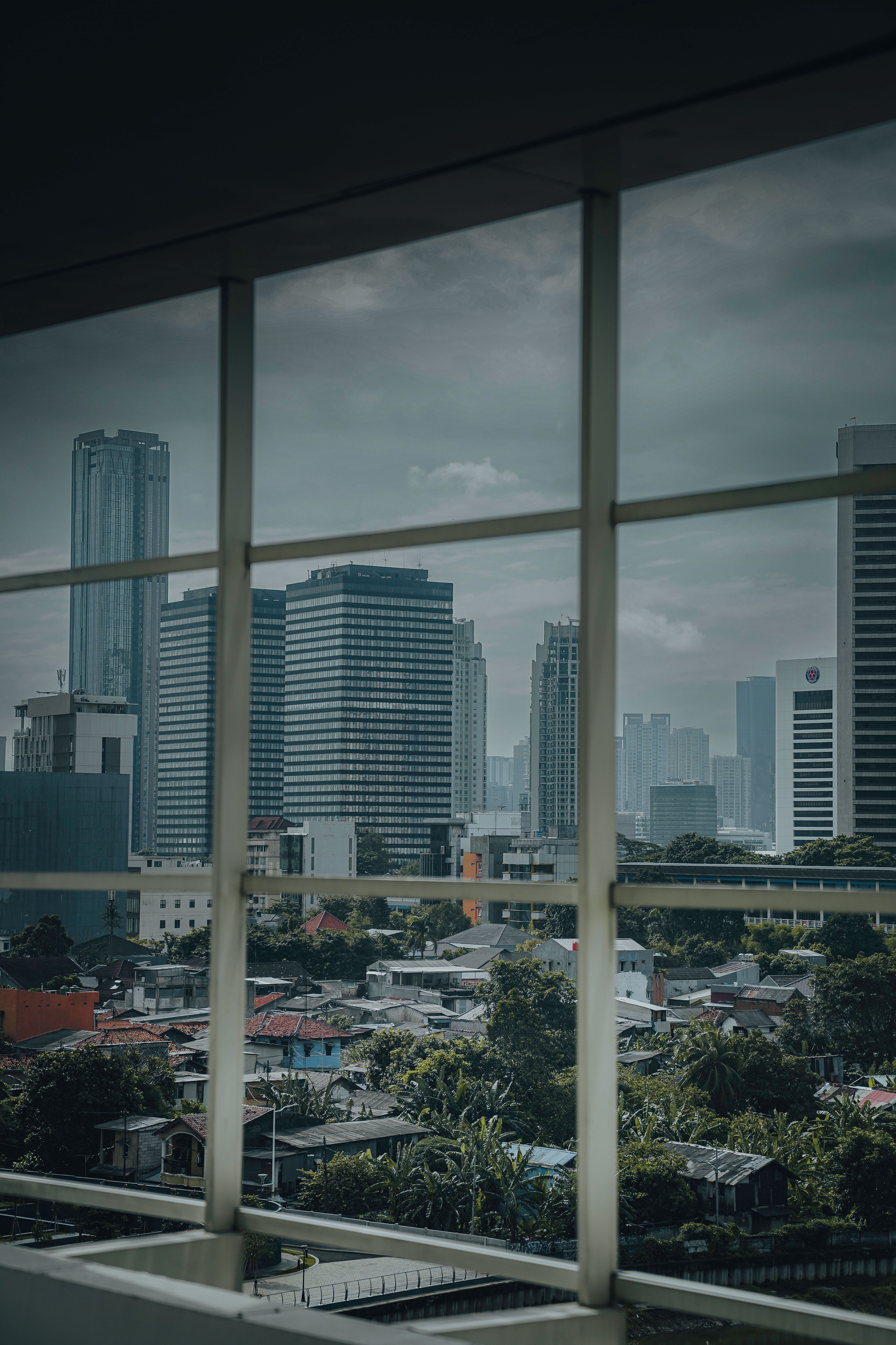 Photo of Skyscrapers Taken Through the Window · Free Stock Photo