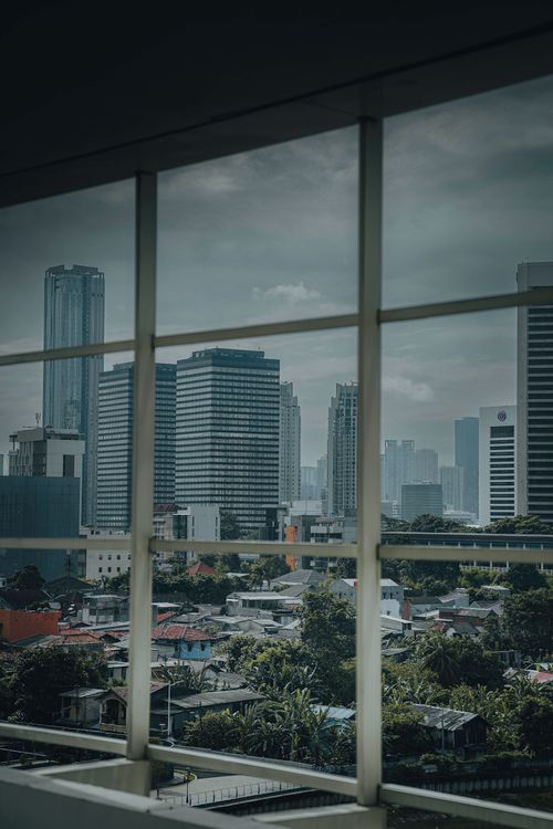 Photo of Skyscrapers Taken Through the Window · Free Stock Photo