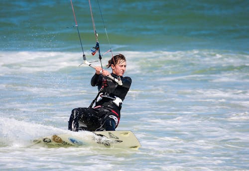 Kitesurfer on Body of Water