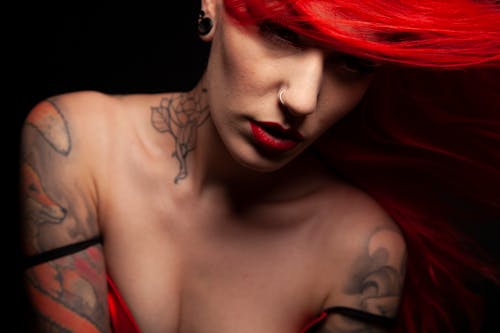 Beautiful Woman with Tattoos on her Body 