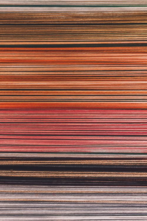 Free Abstract close-up of colorful vertical stripes in a layered pattern. Stock Photo
