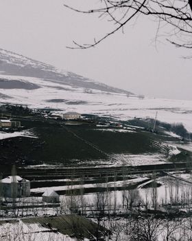 Snow-covered countryside in Yardimli, showcasing Azerbaijan's winter scenery.