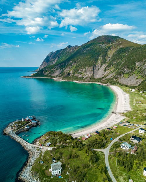 Aerial Photography of Island Under Blue Sky