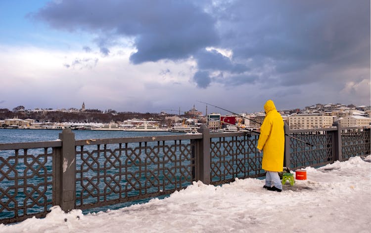 Fisherman In Yellow Raincoat 