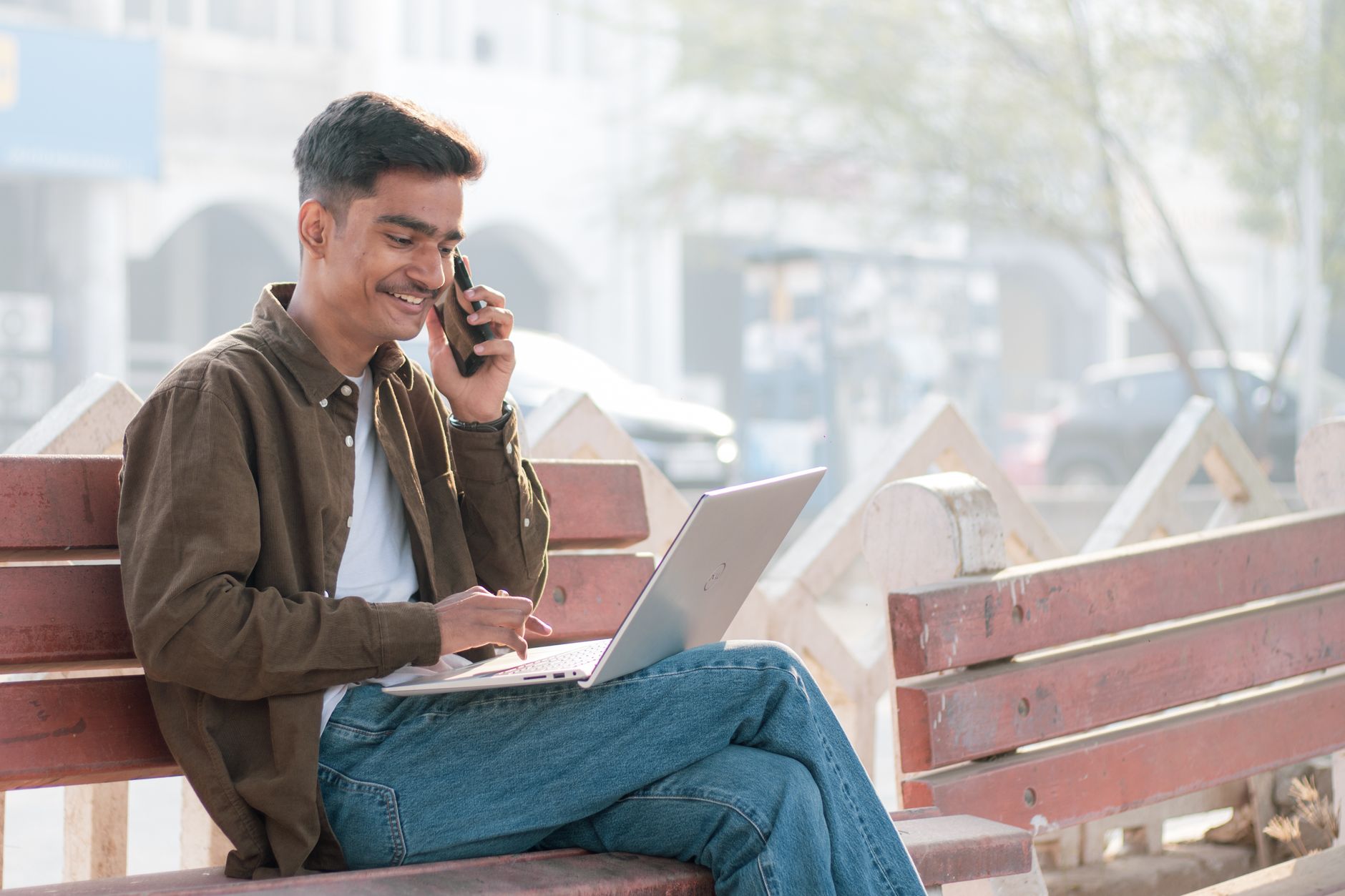 Indian college student using laptop to study with AI tools