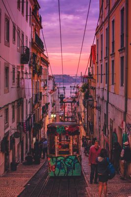 People strolling a historic evening street