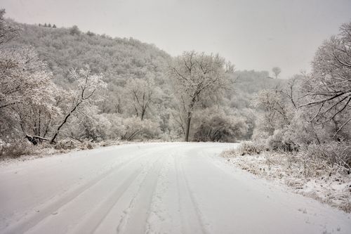 Free Beautiful snowy road and hills in Elba, Minnesota, capturing a serene winter scene. Stock Photo