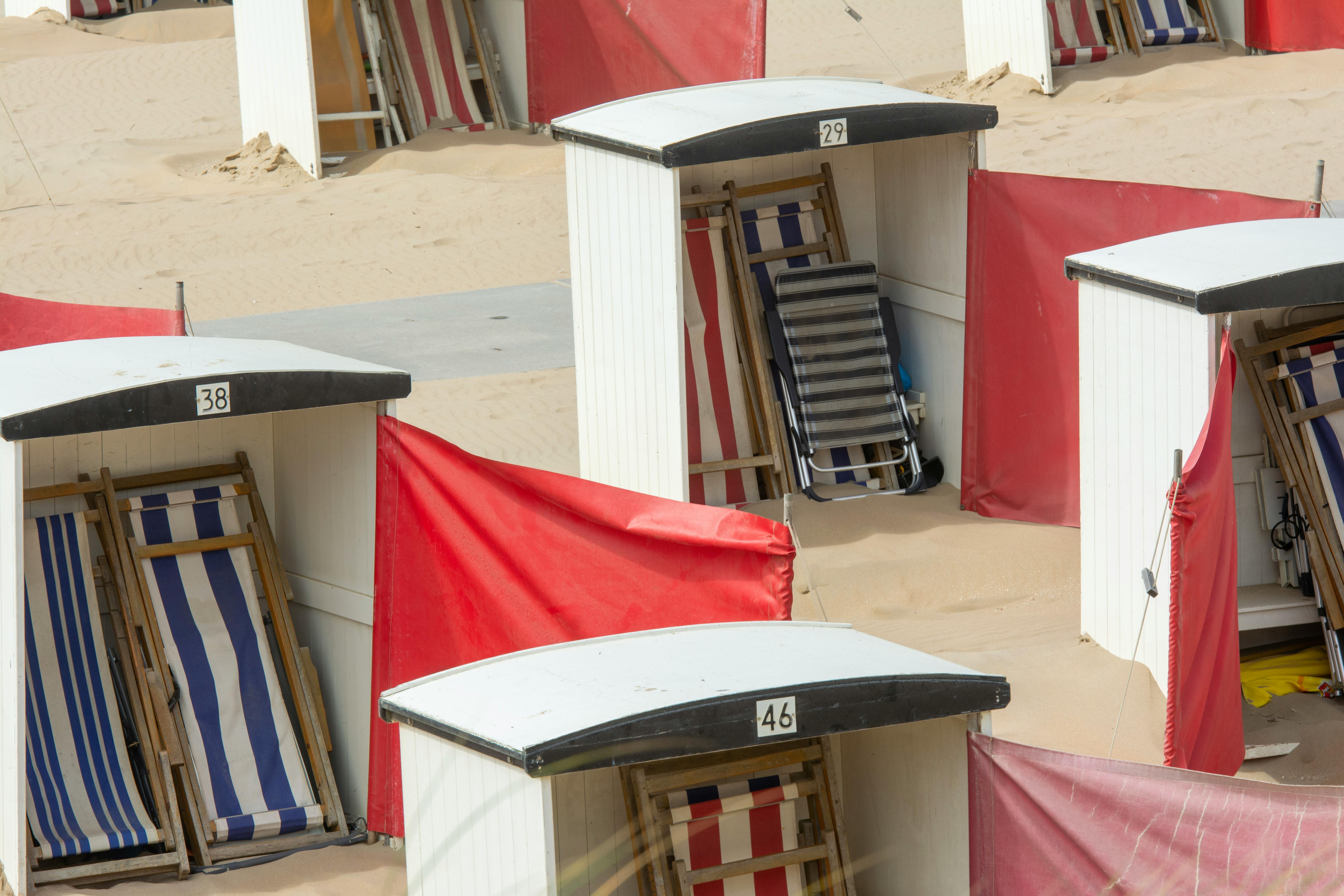 sunbeds in sheds on beach