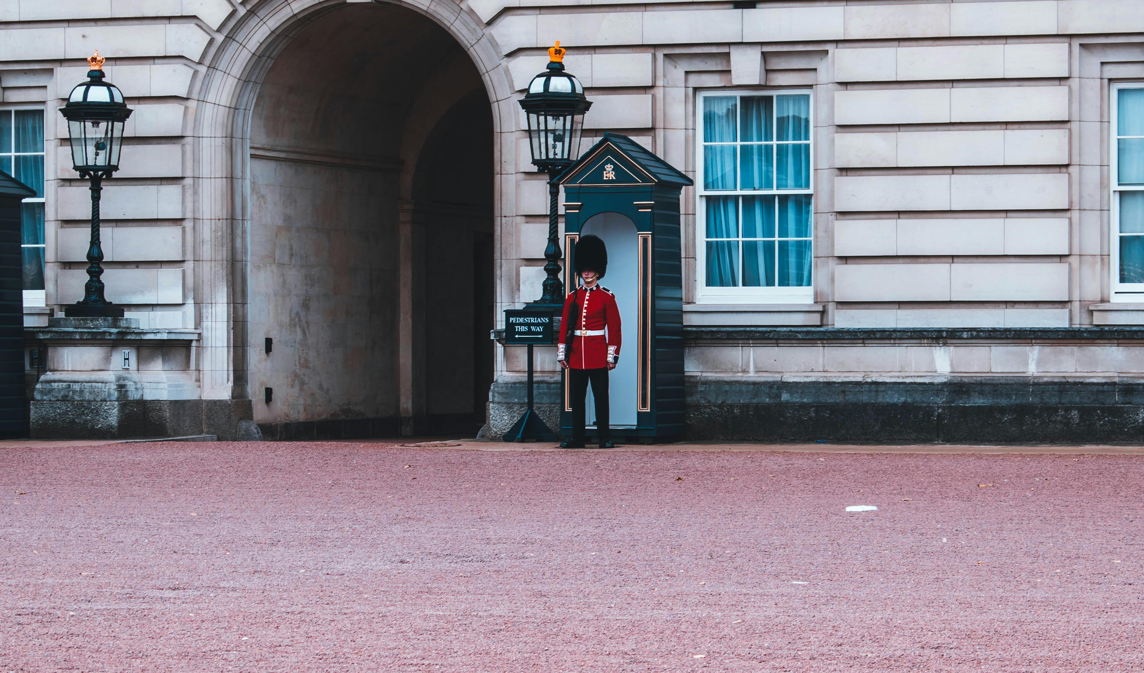 royal guard standing beside building